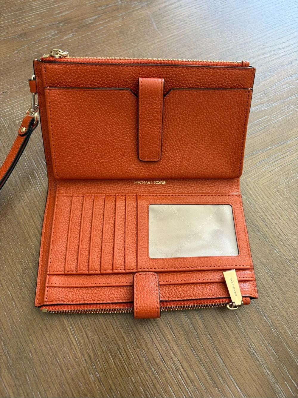Michael Kors Orange Pebbled Leather Wristlet